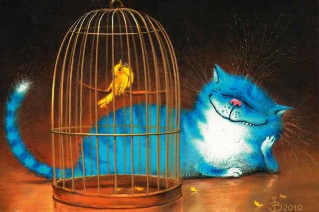 кот слушает пение птички